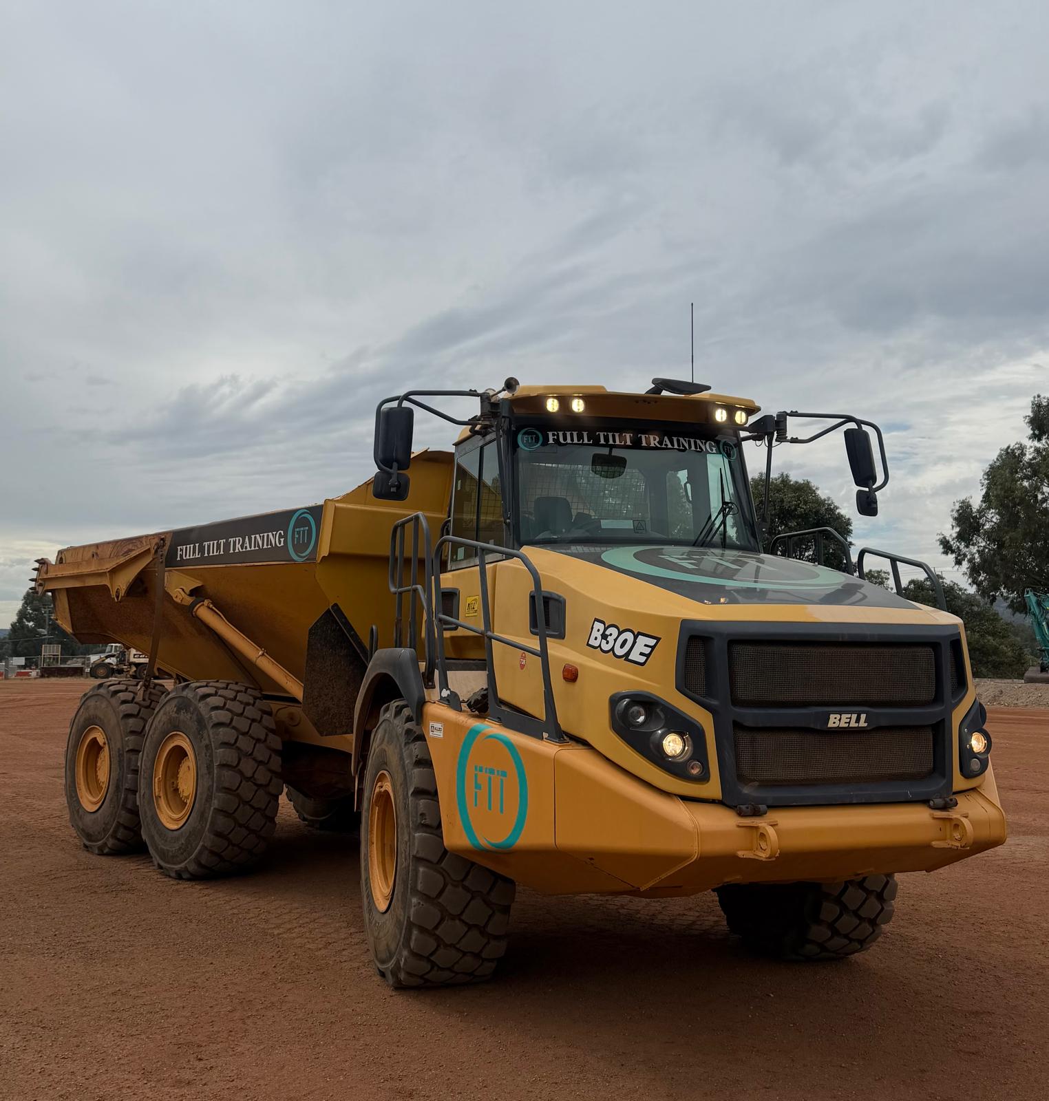 Conduct articulated haul truck operations